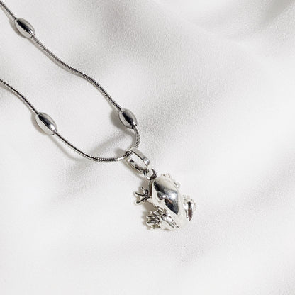 Coqui Pendant | Silver | Purple Snap Jewelers