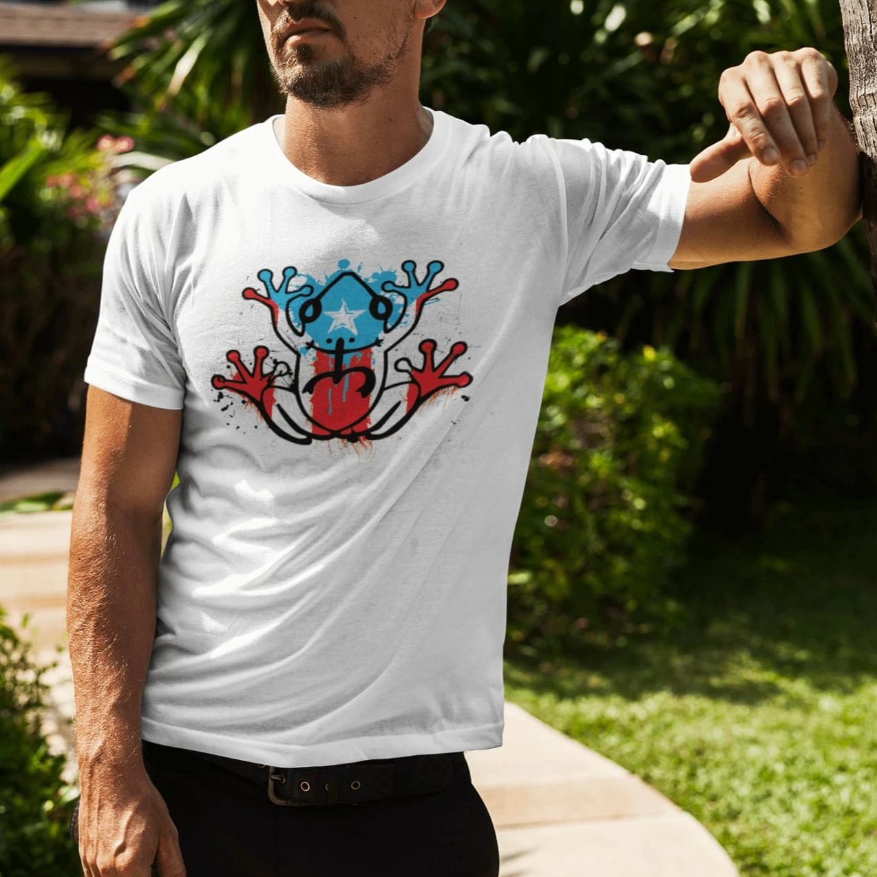 White unisex t-shirt with silhouette of the coquí with the Puerto Rican flag